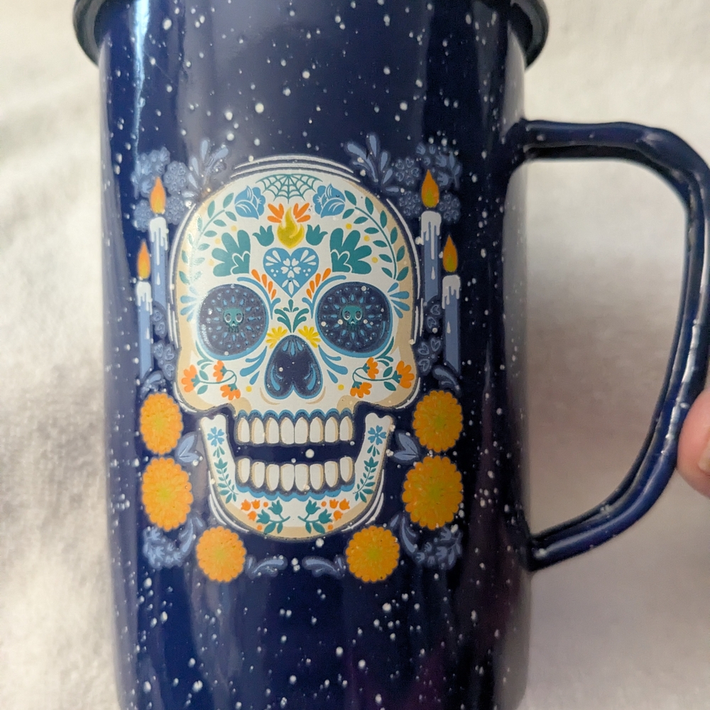 Blue metal camping cup with day of the dead design